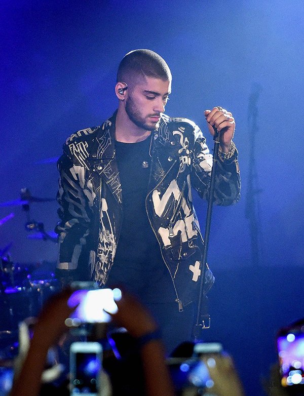 "NEW YORK, NEW YORK - MARCH 25: Zayn Malik performs onstage at ZAYN Album Release Party On The Honda Stage at the iHeartRadio Theater on March 25, 2016 in New York City. (Photo by Dimitrios Kambouris/Getty Images for iHeartRadio )"